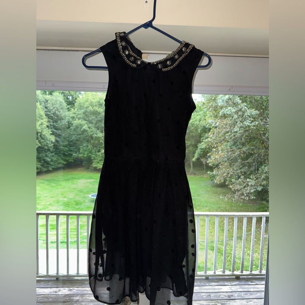 Black polka dot dress  with beaded neck size 10